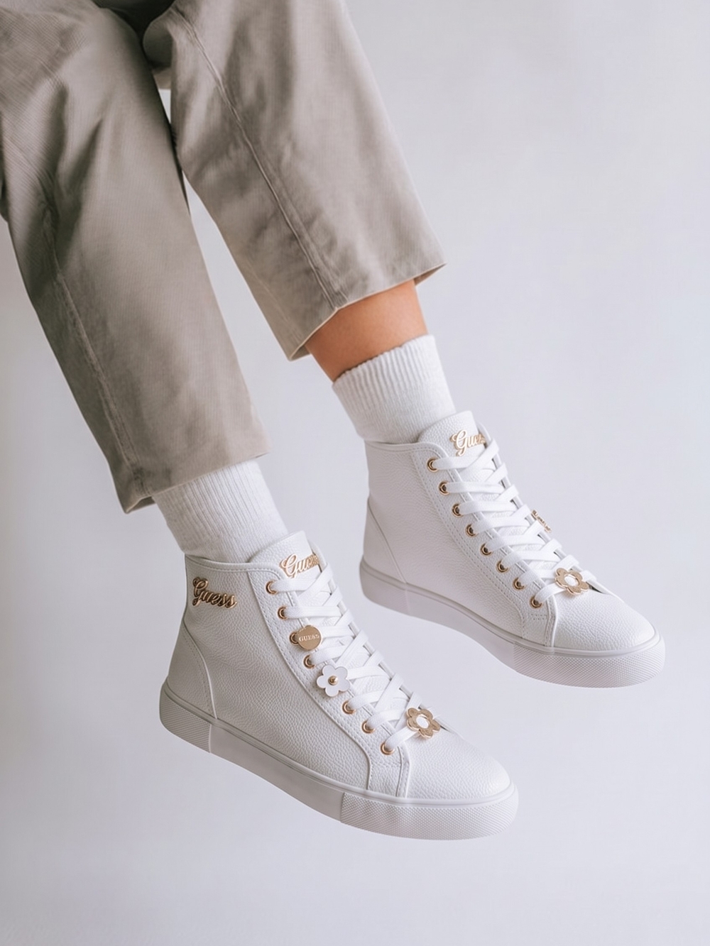 Guess White High-Top Sneakers with Gold Hardware and Floral Lace Charms